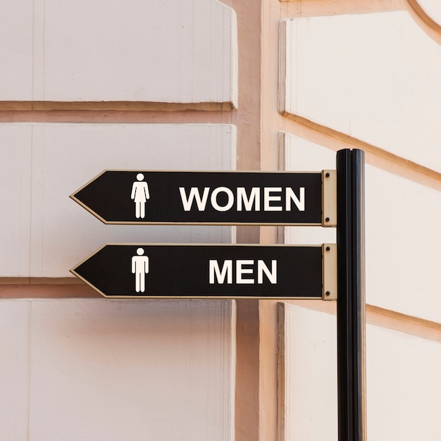 Símbolos de baño para hombres y mujeres.