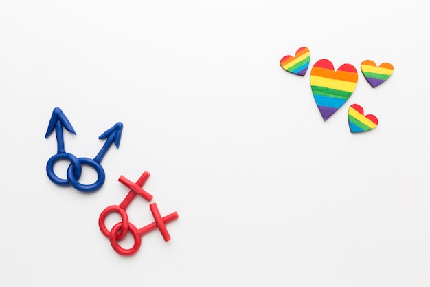 Foto gratuita símbolos y corazones de orientación sexual femenina y masculina
