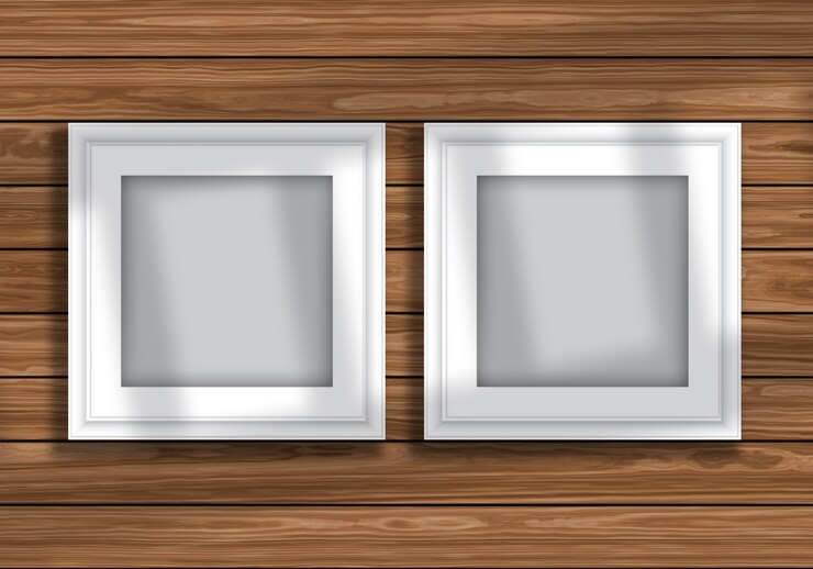 Foto gratuito simulacro de pantalla con marcos de cuadros en blanco en textura de madera