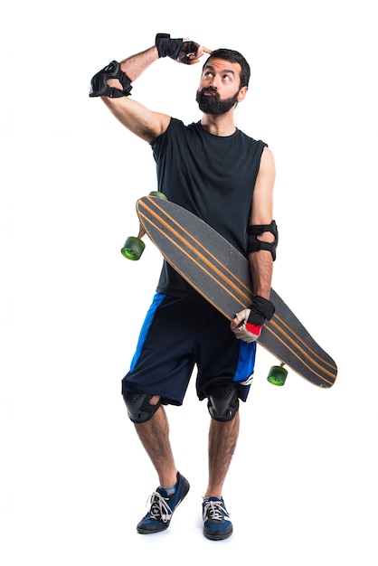 Foto gratuita skater con dudas