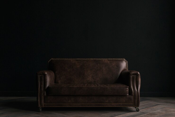 Photo Gratis sofa kulit di ruangan gelap