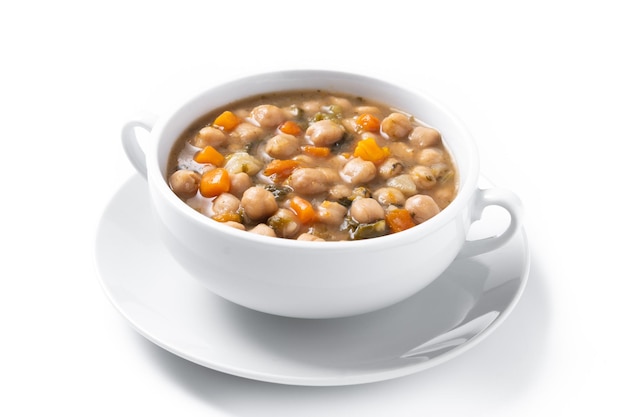 Foto gratuita sopa de garbanzos con verduras en un cuenco en una mesa de madera