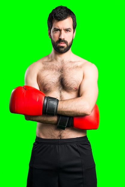 Foto gratuita sportman con guantes de boxeo
