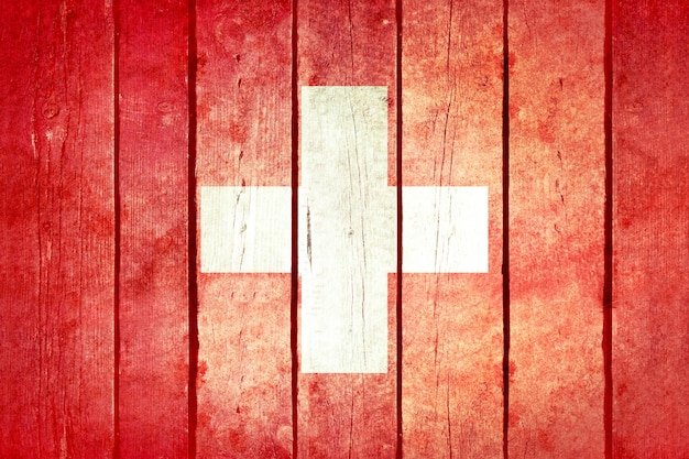 Foto gratuita suiza bandera de madera del grunge.