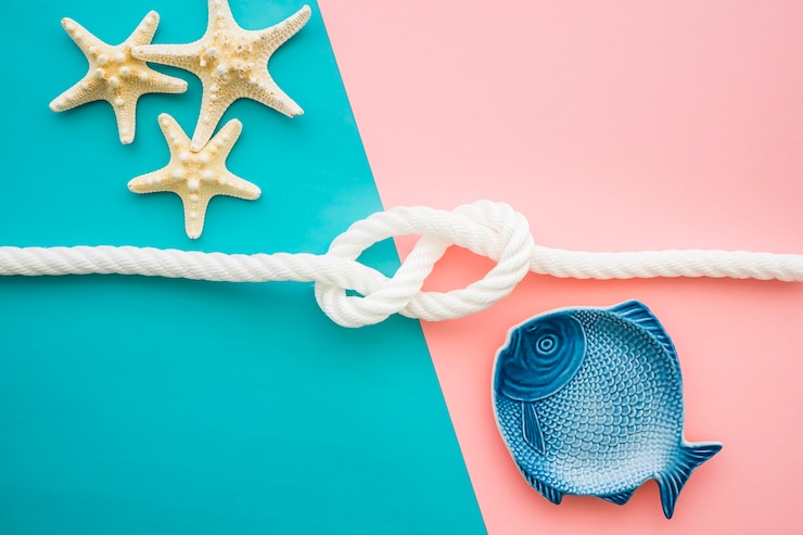 Foto gratuito superficie coloreada con peces y estrellas de mar para el verano