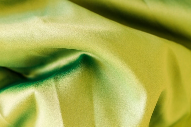 Superficie de material verde con ondas retorcidas