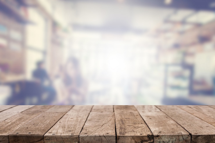 Foto gratuito tabla de mesa con fondo