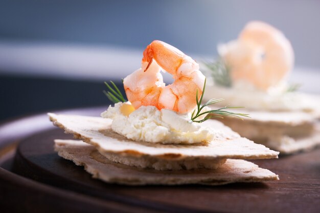 Tapa de gambas con queso debajo