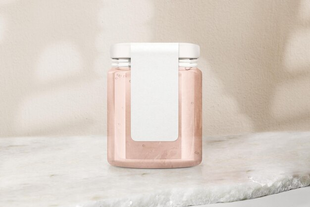 Tarro de cristal de gelatina rosa, envasado de productos alimenticios con espacio de diseño