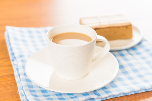 Taza de café con la torta