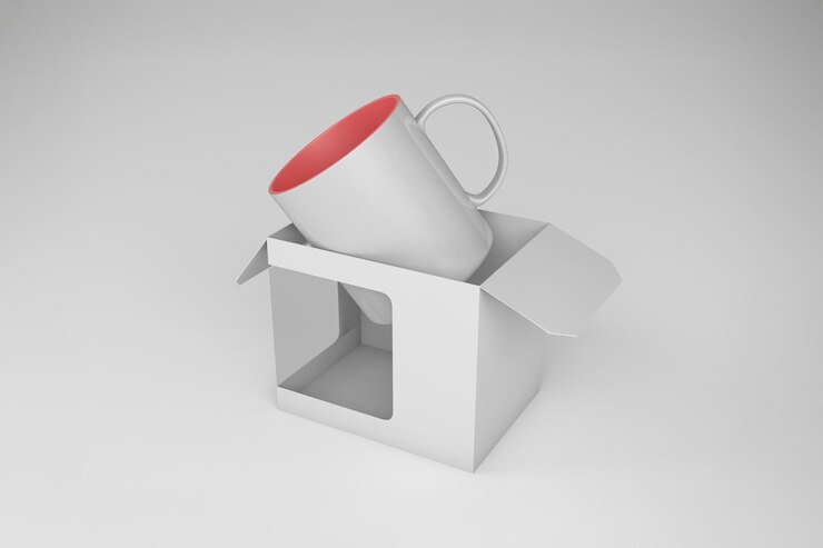 Taza en una caja de producto disparado taza de cerámica blanca con interior rojo