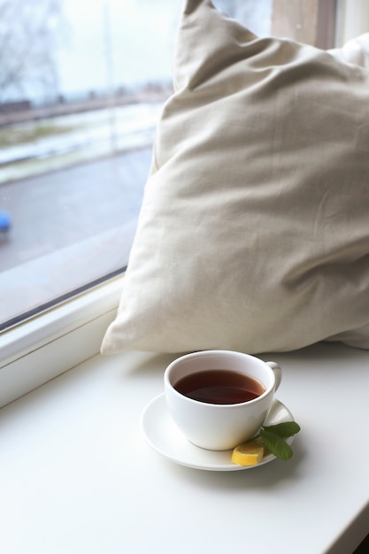 Taza de té en la cama