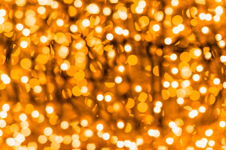 Foto gratuito telón de fondo de un bokeh iluminado que brilla intensamente