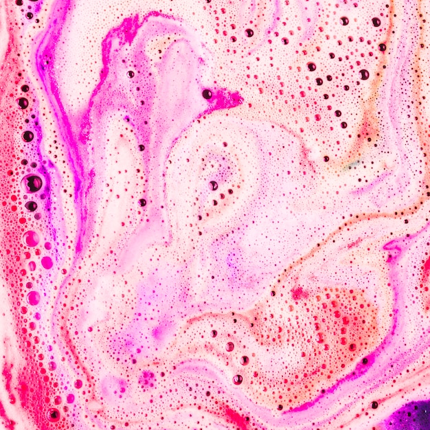 Telón de fondo de disolver bathbomb en agua