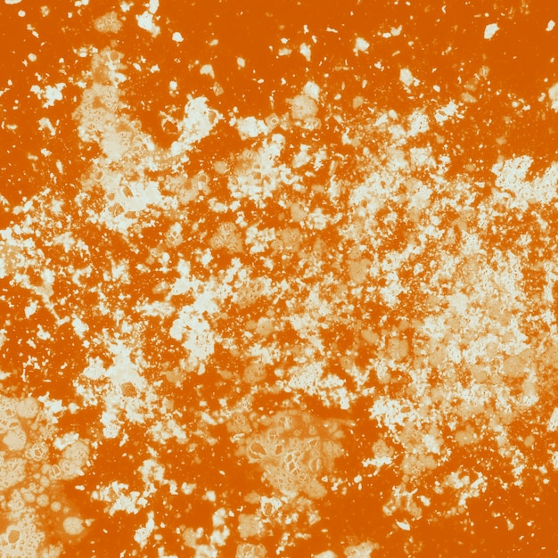 Un telón de fondo con textura grunge naranja