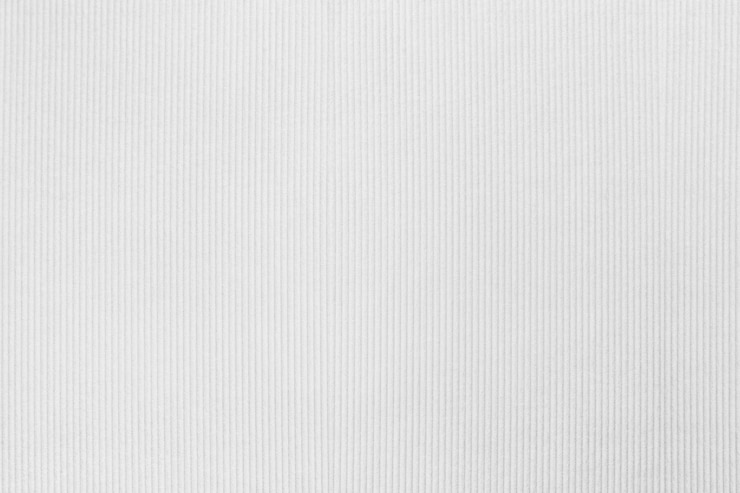 Foto gratuito telón de fondo con textura de tela de pana pastel