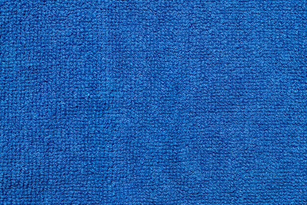 Foto gratuita telón de fondo de textura de tela de tela textil azul suave.