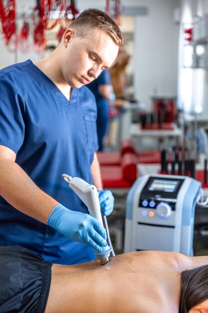 Terapia extracorpórea de ondas de choque Terapia física para los músculos del cuello y la espalda