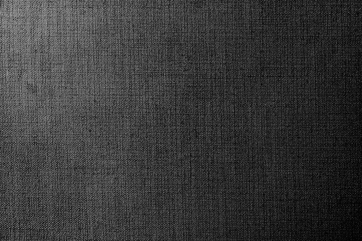 Foto gratuito textil tejido gris texturizado