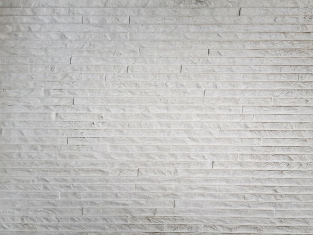 Textura abstracta de la pared del cemento del grunge blanco.