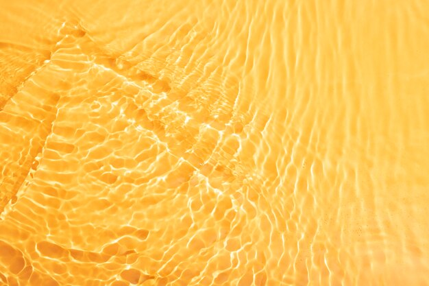 Textura de agua de vista superior en naranja