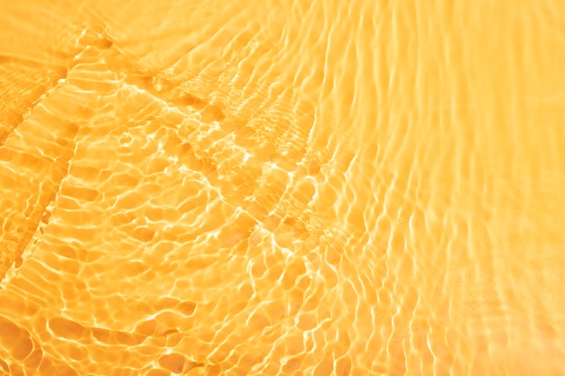 Textura de agua de vista superior en naranja