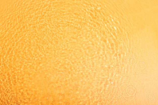 Textura de agua de vista superior en naranja