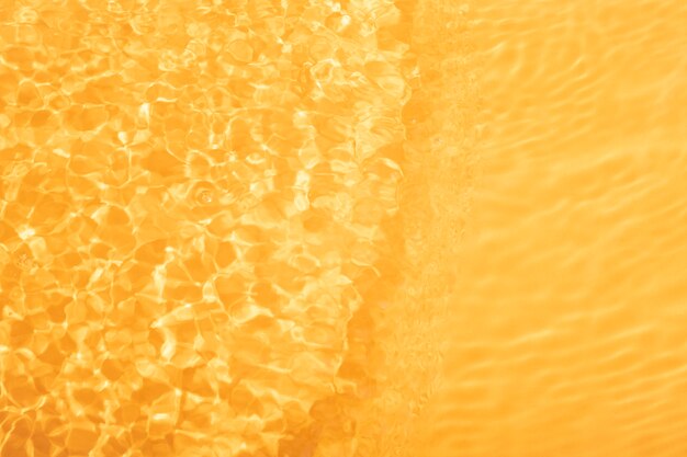 Textura de agua de vista superior en naranja