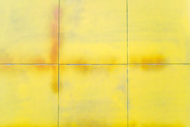 Textura de cuadros amarillos vintage. Fondo geométrico abstracto.