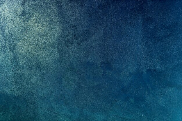 Textura de fondo de pared de pintura azul