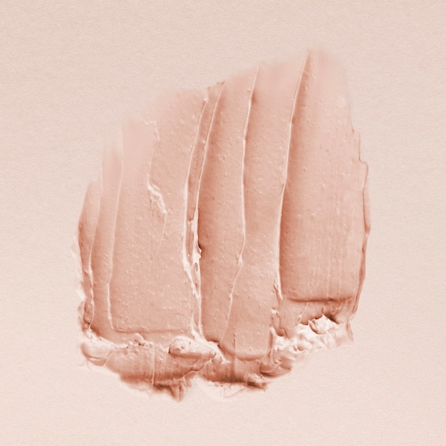 Foto gratuita textura de frotis crema rosa pastel