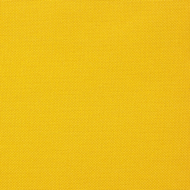Textura de lienzo amarillo para el fondo