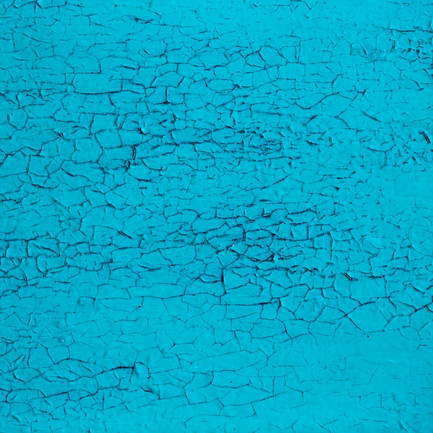 Textura de pared azul transparente agrietada