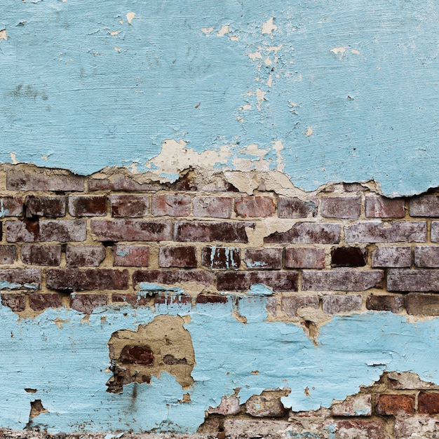 Foto gratuita textura de paredes de ladrillo pintado pelado