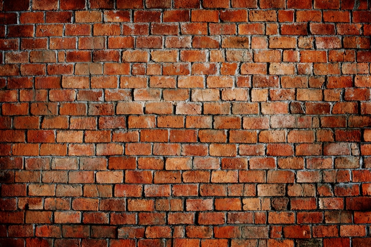 Foto gratuito textura de patrón de pared de ladrillo rojo