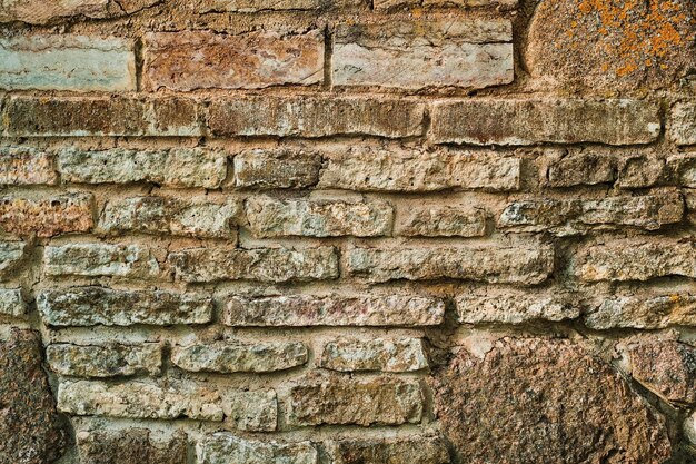 La textura de la piedra Fondo de piedra de diferentes piedras y arenisca Idea para el diseño de interiores de fachada de casa o edificio