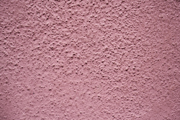 textura de piedra pintada de color rosa púrpura