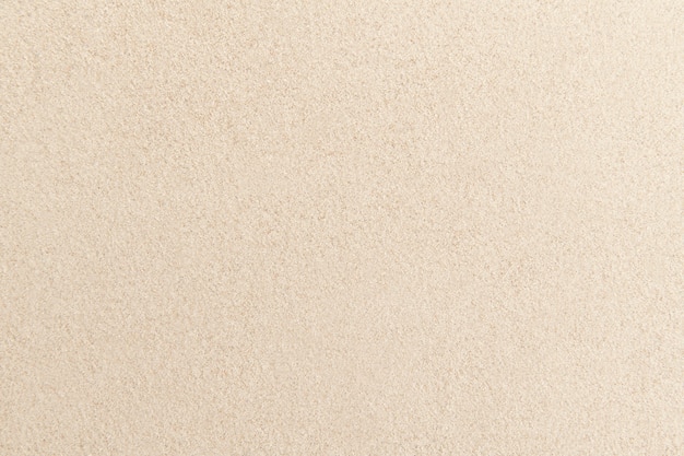 Textura de la superficie de arena fondo beige zen y concepto de paz