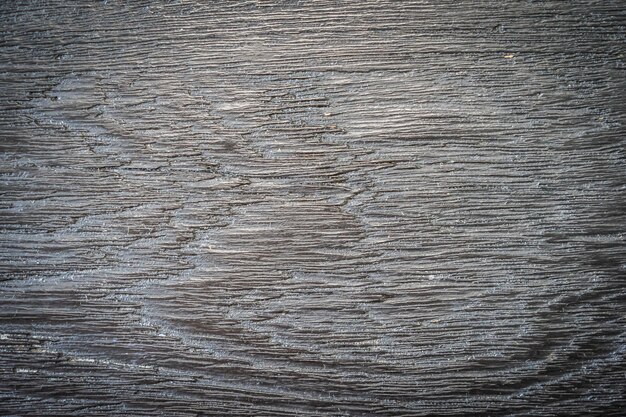 Textura y superficie de madera gris y negra.
