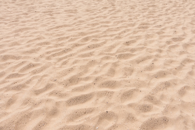 Foto gratuito texturas de arena vacia