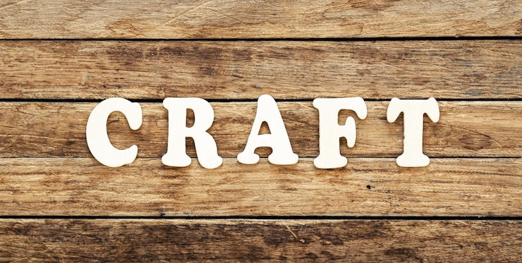 Photo Gratis the word craft written on wood letters on wooden background top view