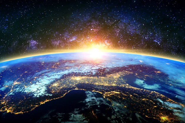 Tierra y galaxia. elementos de esta imagen proporcionados por la nasa. Foto gratis