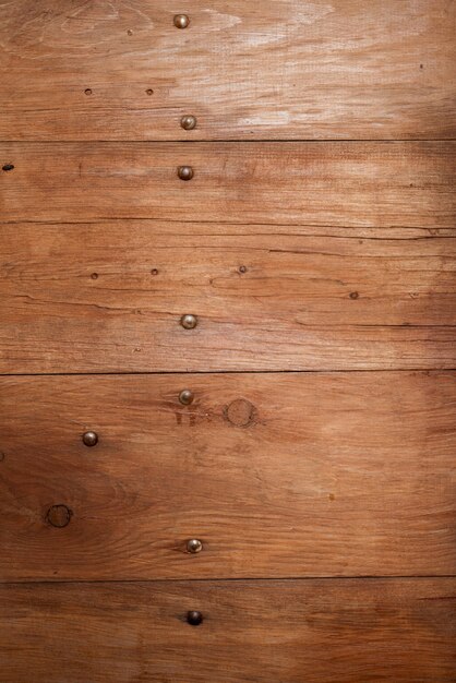 Tiro vertical del primer de una pared de madera - ideal para el fondo o un blog