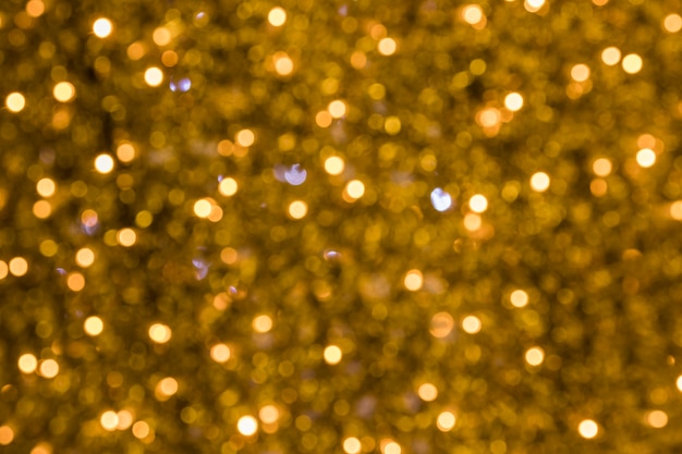 Toma de fotograma completo de fondo dorado bokeh