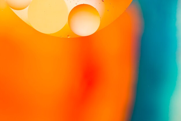 Tonos naranjas de burbujas con luces de gradiente