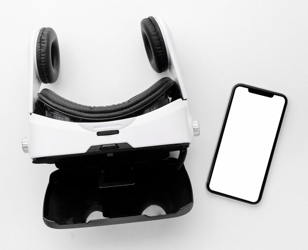 Top view auriculares de realidad virtual y móvil