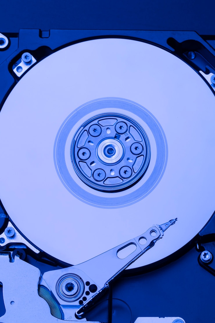 Photo Gratis top view hard drive in blue light