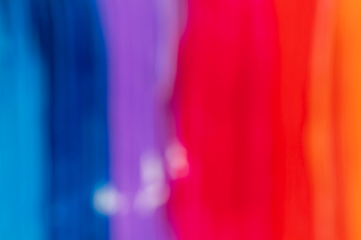 Foto gratuito trazos borrosos de pintura roja y azul