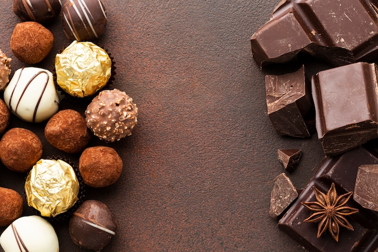 Foto gratuito trozos de chocolate y trufas