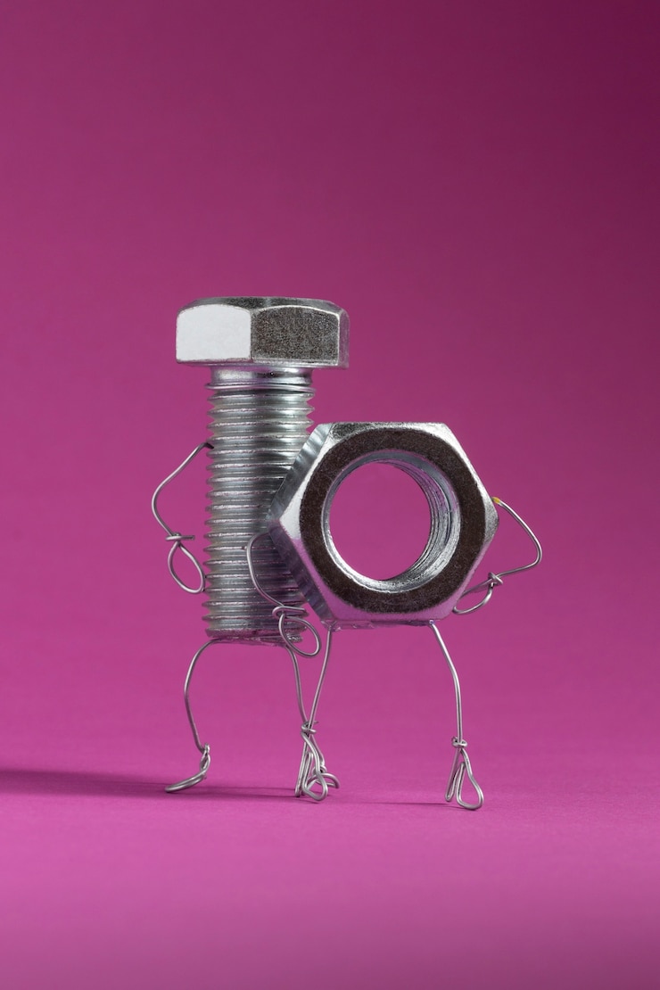 Foto gratuito tuerca de tornillo animada y fondo rosa.